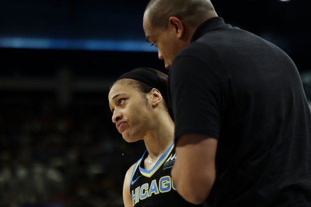 Sky assistant coach Sydney Johnson speaks to guard Chennedy Carter during a game against the Fever on June 23, 2024, at Wintrust Arena. (Eileen T. Meslar/Chicago Tribune)