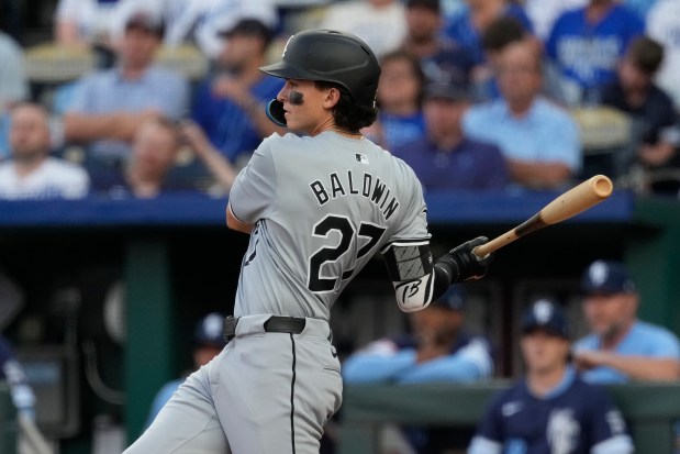 Brooks Baldwin #27 of the Chicago White Sox hits a single on his first at bat in his Major League debut in the third inning against the Kansas City Royals at Kauffman Stadium on July 19, 2024 in Kansas City, Missouri. (Photo by Ed Zurga/Getty Images)