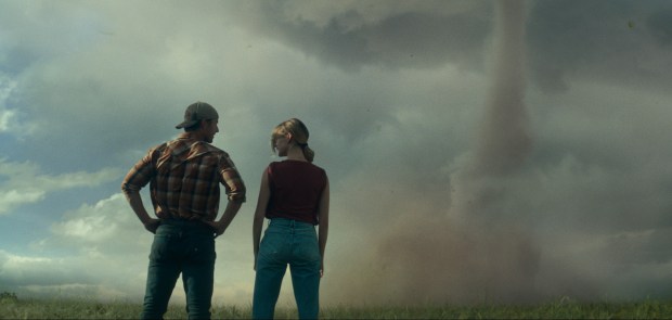 Glen Powell, left, and Daisy Edgar-Jones in "Twisters," directed by Lee Isaac Chung. (Universal Pictures/TNS)