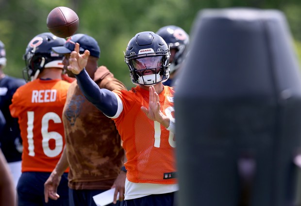 Chicago Bears quarterback Caleb Williams (18) throws a pass during Organized Team Activities at Halas Hall in Lake Forest on Friday, May 31, 2024. (Chris Sweda/Chicago Tribune)