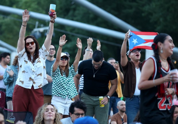 The crowd reacts as Buscabulla performs at Pritzker Pavilion during the Millennium Park Summer Music Series in Chicago on July 11, 2024. (Chris Sweda/Chicago Tribune)