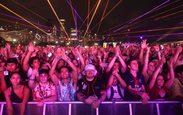 Fans watch as headliner Odesza performs during Day 3 of Lollapalooza on Aug. 5, 2023, in Chicago's Grant Park. (Trent Sprague/Chicago Tribune)