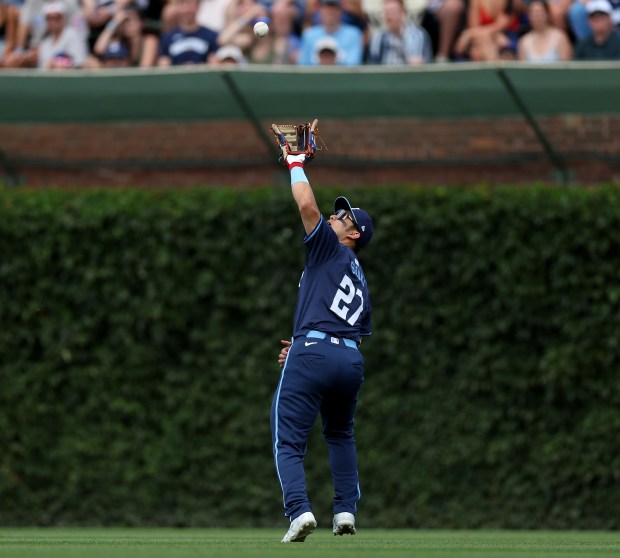 Cubs right fielder Seiya Suzuki catches a fly ball in the third inning on July 5, 2024, at Wrigley Field. (Chris Sweda/Chicago Tribune)