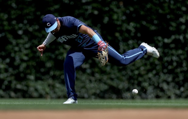 Cubs right fielder Seiya Suzuki makes an error on a fly ball in the fourth inning on July 5, 2024, at Wrigley Field. (Chris Sweda/Chicago Tribune)