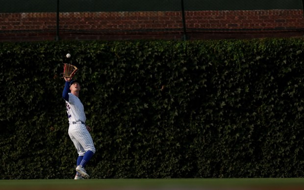 Chicago Cubs center fielder Pete Crow-Armstrong (52) catches a deep fly ball in the first inning of a game against the Arizona Diamondbacks at Wrigley Field in Chicago on July 20, 2024. (Chris Sweda/Chicago Tribune)