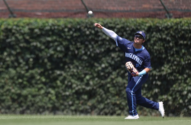 Cubs right fielder Seiya Suzuki throws the ball toward the infield in the first inning on July 19, 2024, at Wrigley Field. (Chris Sweda/Chicago Tribune)