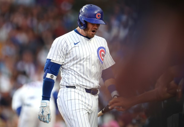 Chicago Cubs left felder Ian Happ (8) yells out after striking out in the fifth inning of a game against the Arizona Diamondbacks at Wrigley Field in Chicago on July 20, 2024. (Chris Sweda/Chicago Tribune)