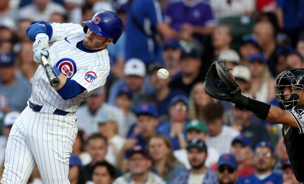 Chicago Cubs left fielder Ian Happ strikes out in the fifth inning of a game against the Arizona Diamondbacks at Wrigley Field in Chicago on July 20, 2024. (Chris Sweda/Chicago Tribune)