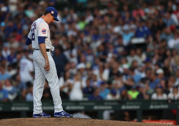 Chicago Cubs starting pitcher Kyle Hendricks stands on the mound after giving up a 2-run home run to Arizona Diamondbacks outfielder Corbin Carroll in the fifth inning of a game at Wrigley Field in Chicago on July 20, 2024. (Chris Sweda/Chicago Tribune)