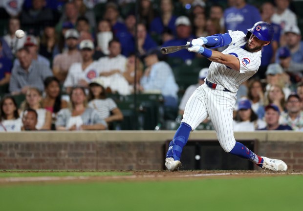 Chicago Cubs hitter Miles Mastrobuoni doubles in the ninth inning of a game against the Arizona Diamondbacks at Wrigley Field in Chicago on July 20, 2024. (Chris Sweda/Chicago Tribune)