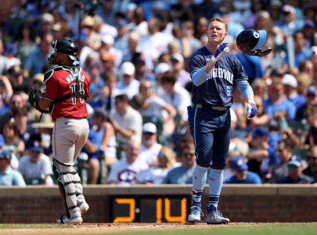 Cubs center fielder Pete Crow-Armstrong tosses his helmet aside after striking out to end the seventh inning on July 19, 2024, at Wrigley Field. (Chris Sweda/Chicago Tribune)