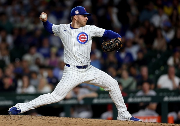 Chicago Cubs relief pitcher Hunter Bigge delivers to the Arizona Diamondbacks in the ninth inning of a game at Wrigley Field in Chicago on July 20, 2024. (Chris Sweda/Chicago Tribune)