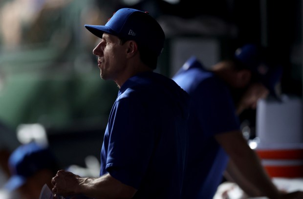 Chicago Cubs manager Craig Counsell (30) looks out of the dugout in the 8th inning of a game against the Arizona Diamondbacks at Wrigley Field in Chicago on July 20, 2024. (Chris Sweda/Chicago Tribune)