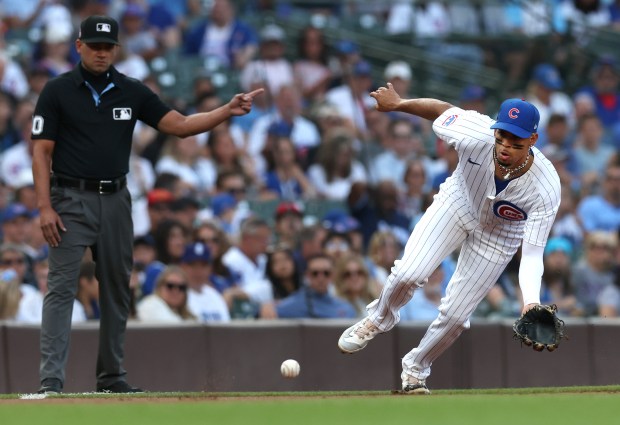 Chicago Cubs third baseman Christopher Morel fields a ground ball in the second inning of a game against the Arizona Diamondbacks at Wrigley Field in Chicago on July 20, 2024. (Chris Sweda/Chicago Tribune)