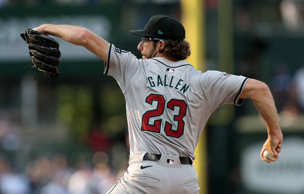 Arizona Diamondbacks starting pitcher Zac Gallen (23) delivers to the Chicago Cubs in the first inning of a game at Wrigley Field in Chicago on July 20, 2024. (Chris Sweda/Chicago Tribune)