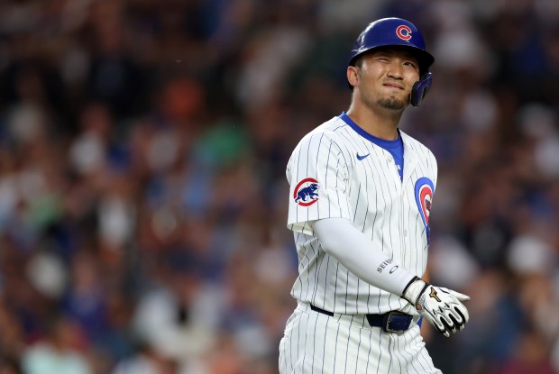 The Cubs' Seiya Suzuki reacts as he walks back to the dugout after flying out deep with the bases loaded to end the fifth inning against the Giants on June 18, 2024, at Wrigley Field. (Chris Sweda/Chicago Tribune)