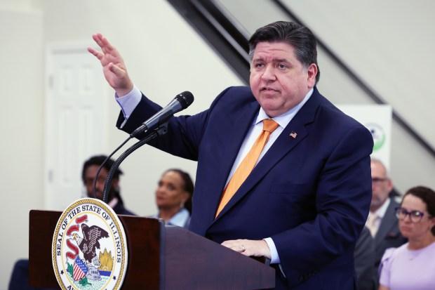 Illinois Gov. J.B. Pritzker speaks to the media on June 25, 2024, at Eyes on the Future Child Development Center in Chicago. Pritzker on Wednesday signed new legislation that includes a prohibition on insurance plans requiring what is known as "step therapy," which is when the insurer requires a customer to try different treatments or medications before those prescribed by their doctor. (Terrence Antonio James/Chicago Tribune)