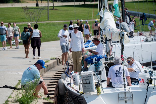 A boat crew prepare their boat for the Race to Mackinac on Saturday, July 13, 2024, at the Chicago Yacht Club in Chicago. (Vincent Alban/for Chicago Tribune)