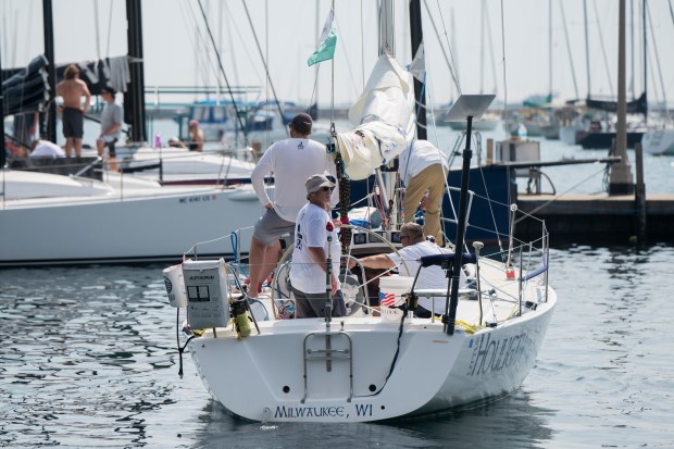 A boat crew prepares their boat for the Race to Mackinac on Saturday, July 13, 2024, at the Chicago Yacht Club in Chicago. (Vincent Alban/for Chicago Tribune)