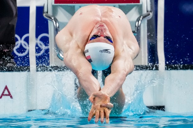 Ryan Murphy, of the United States, competes during a heat in the men's 200-meter backstroke at the 2024 Summer Olympics, Wednesday, July 31, 2024, in Nanterre, France. (AP Photo/Matthias Schrader)