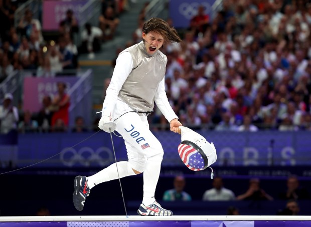 Lee Kiefer of Team United States celebrates winning the Women's Foil Individual Semifinal Bout between Lee Kiefer of Team United States and Alice Volpi of Team Italy on day two of the Olympic Games Paris 2024 at Grand Palais on July 28, 2024 in Paris, France. (Photo by Al Bello/Getty Images)