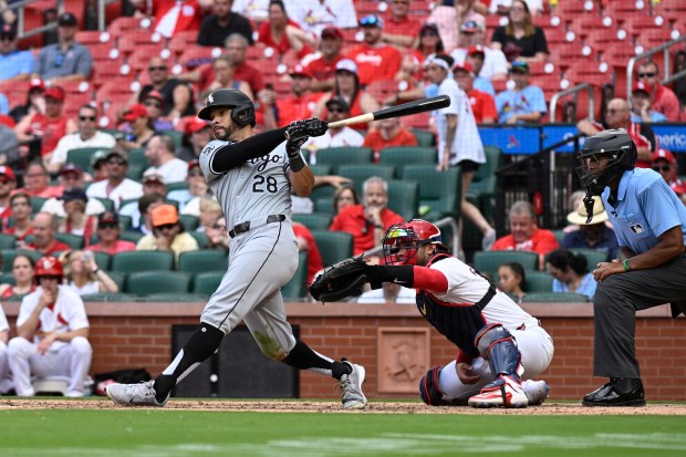 White Sox's Tommy Pham hits an RBI single during the 10th inning of a baseball game against the Cardinals on May 4, 2024, in St. Louis. (AP Photo/Jeff Le)