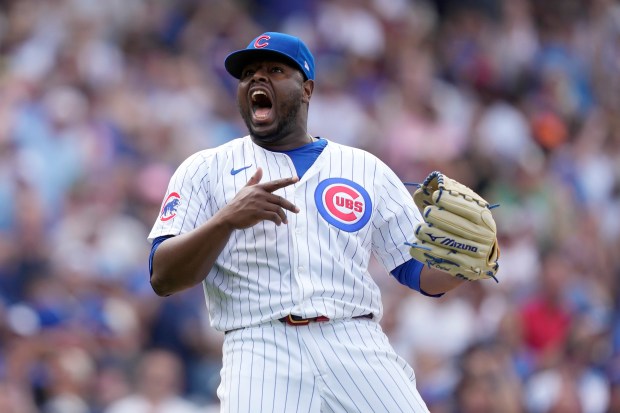 Chicago Cubs relief pitcher Héctor Neris reacts after striking out New York Mets' Jeff McNeil to end a baseball game Saturday, June 22, 2024, in Chicago. (AP Photo/Charles Rex Arbogast)