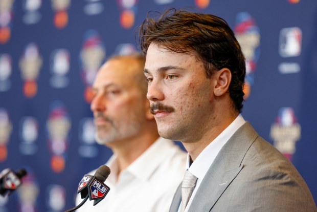 Pittsburgh Pirates pitcher Paul Skenes, right, speaks during MLB baseball All-Star Game media day Monday, July 15, 2024, in Arlington, Texas. (Elías Valverde II/The Dallas Morning News via AP)