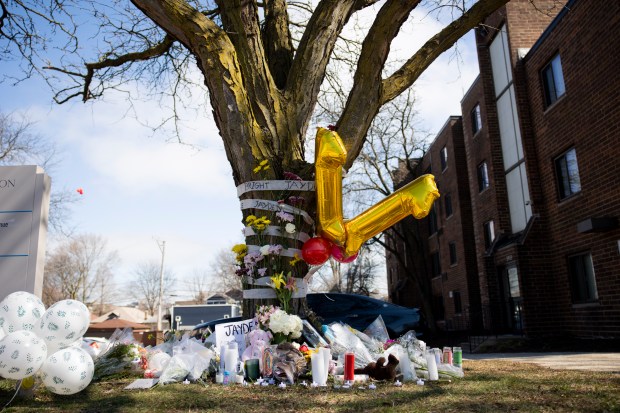 A memorial for Jayden Perkins outside his home in Chicago on March 15, 2024. (Vincent Alban/Chicago Tribune)