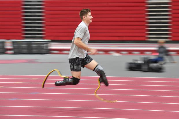 Paralympian sprinter Hunter Woodhall works out at the Randal Tyson Track Center on Jan. 18, 2024, in Fayetteville, Ark. (AP Photo/Michael Woods)