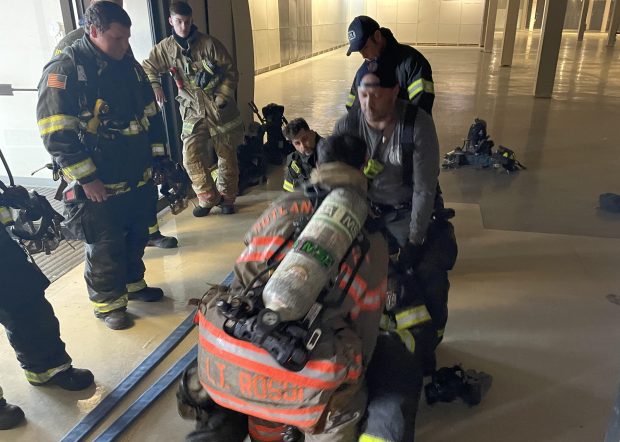 West Dundee crews practice drills for rescuing a firefighter who's in distress at the empty Spring Hill Mall, which is being used by local fire and police departments for training exercises before the building is demolished. (West Dundee Fire Department)