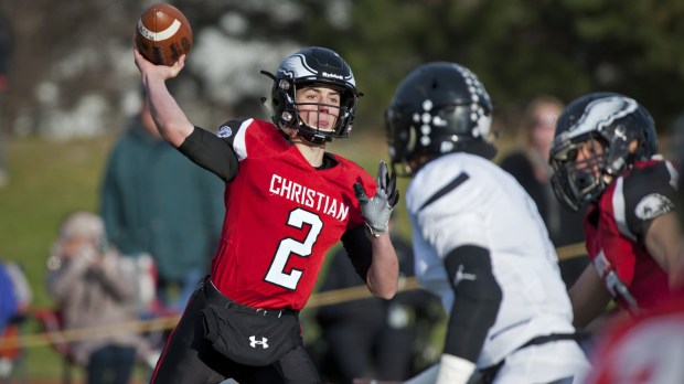 Aurora Christian quarterback Ethan Hampton fires a pass against Lena-Winslow in a playoff game on Saturday, Nov. 10, 2018.