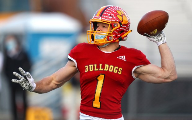 Batavia's Trey Urwiler (1) looks for a target against Wheaton Warrenville South during a DuKane Conference game in Batavia on Friday, April 9, 2021.