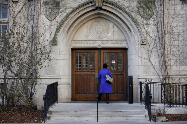 A woman enters the Northwestern University School of Law building in Chicago on Dec. 11, 2015. (Joshua Lott for The New York Times)