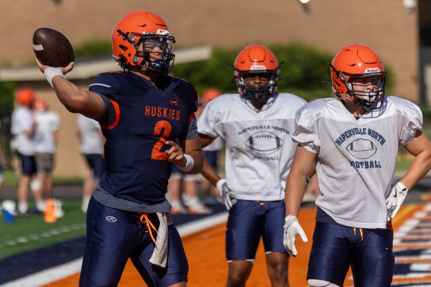 Naperville North's Jacob Bell (2) throws the ball during practice in Naperville on Wednesday, July 17, 2024. (Troy Stolt/for the Naperville Sun)