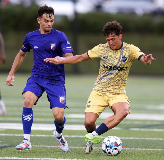 River Light's Alex Barger (17), right, Indiana University sophomore defender and former Naperville North four-year starter steals the ball away from Chicago Dutch Lions' Dardan Sylejmani (9) during a United Soccer League match Wed, July 10, 2024 at Aurora University's Spartan Stadium in Montgomery.H. Rick Bamman / For the Naperville Sun