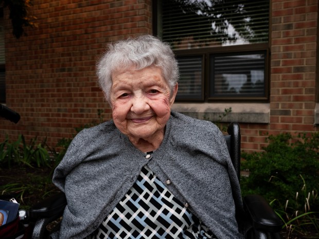 St. Patrick's Residence Nursing & Rehabilitation resident Grace Pecora, 103, poses for a portrait at the home's 1400 Brookdale Road facility in Naperville on July 9, 2024. (Tess Kenny/Naperville Sun)