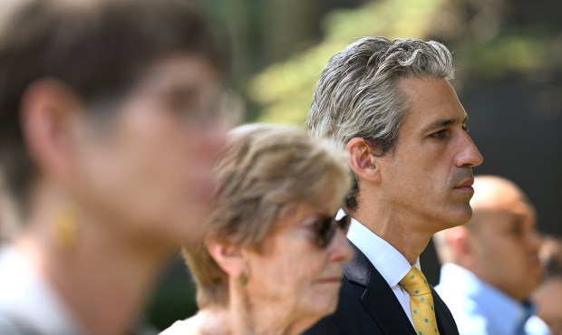 Right, in suit and tie, standing in the audience is Evanston Mayor Daniel Biss at the July 22, 2024 First Responder Remembrance Ceremony at Firemen's Park in Evanston. (Karie Angell Luc/Pioneer Press)