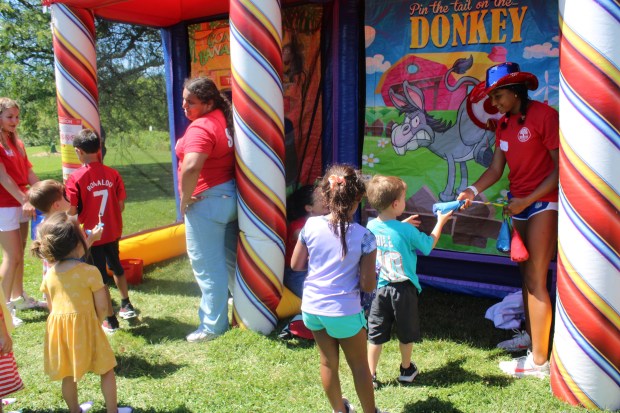 The Star Spangled Splash - a pint-sized patriotic celebration of red white and blue with games, prizes, confetti fireworks show and public swim - was hosted by the Wilmette Park District at Centennial Park on July 3. (Gina Grillo/Pioneer Press)