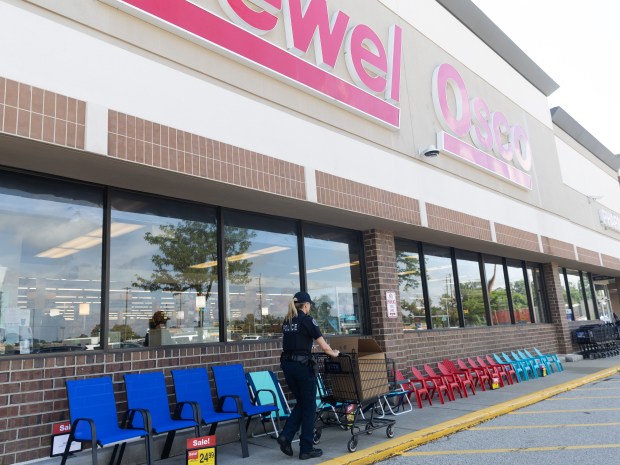 Officer Amy Cholewa of the Buffalo Grove Police Department collects food donations at Jewel-Osco in Buffalo Grove on Saturday, June 29, 2024. (Trent Sprague/for the Pioneer Press)