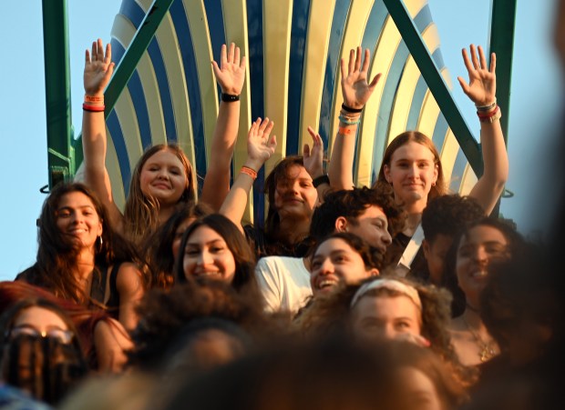 Top left, back row, on Pharaoh's Fury is Martyna Olszewski of Jefferson Park at Lincolnwood Fest on July 26, 2024 in Lincolnwood at Proesel Park. (Karie Angell Luc/Pioneer Press)