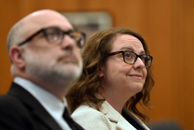 Right, Kim Berenberg, chief executive officer of Glenkirk, listens to the presentation during the Northbrook Board of Trustees meeting on July 23, 2024. (Karie Angell Luc/Pioneer Press)