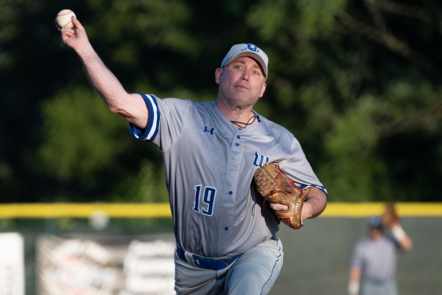 WarDogs pitcher Ken Brueder throws the ball during a Lake County Corn Dogs-hosted game in Crown Point on Thursday, July 18, 2024. (Kyle Telechan/for the Post-Tribune)