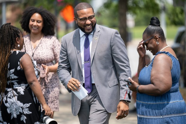 Gary mayor Eddie Melton laughs as he arrives to a press conference to discuss demolition and development in the city on Tuesday, July 23, 2024. (Kyle Telechan/for the Post-Tribune)