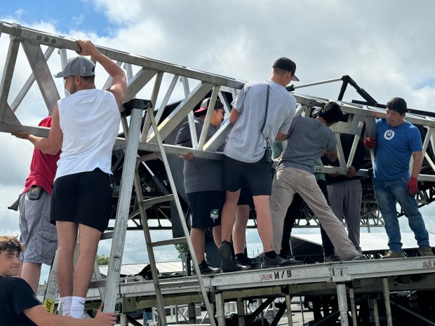 Workers erect the $1 million grandstage stage for the Porter County Fair on Tuesday, July 16, 2024. (Doug Ross/for Post-Tribune)