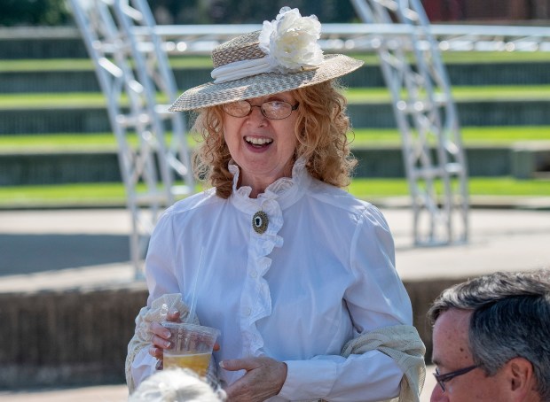 Sandra Young portrays Harriet Colfax who was the lighthouse keeper in Michigan City from 1861 to 1904 during the dedication of the Muskegon Shipwreck Nature Preserve on Thursday, July 18, 2024 at the Old Lighthouse Museum in Michigan City. The preserve is located off the shore of Mount Baldy near Indiana Dunes National Park. (Michael Gard/for the Post-Tribune)