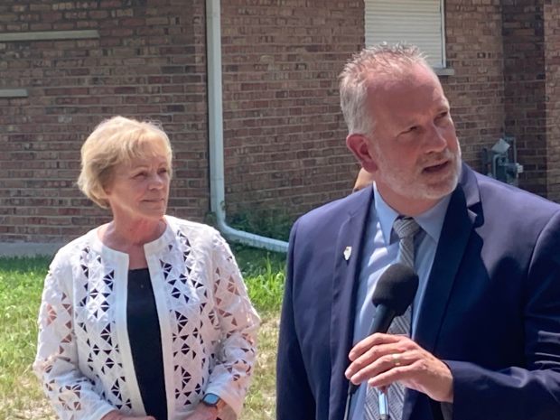 Lansing Mayor Patricia Eidam, left, and Dan Podgorski, village administrator, speak at an event July 30, 2024, in the suburb marking the end of a flood relief project. (Mike Nolan / Daily Southtown)