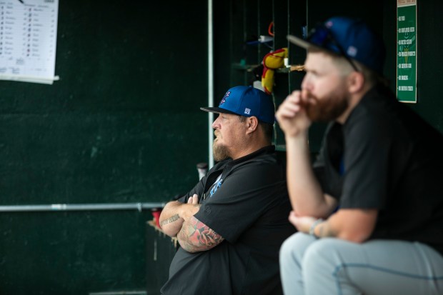 Windy City Thunderbolts' manager, Bobby Jenks sits in the dugout while his team is on the field during a game against the Joliet Slammers, in Joliet on Saturday, July 20, 2024. (Vincent D. Johnson/for the Daily Southtown)