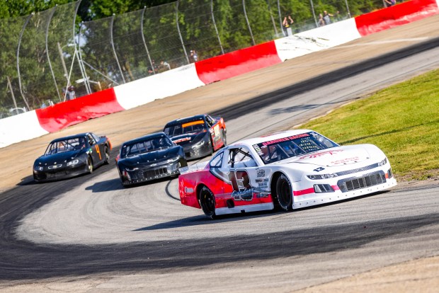 Scotty Gardner leads the field during a Mid-Am race at Grundy County Speedway on Friday, June 21, 2024 (Chris Goodaker / Daily Southtown)