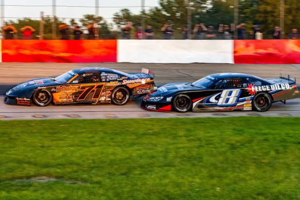 Eddie Hoffman (8) applies pressure to Blake Brown during a late model event at Grundy County Speedway on Saturday, July 6, 2024. (Chris Goodaker / Daily Southtown)